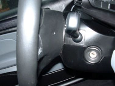 Depress steering wheel retainers
