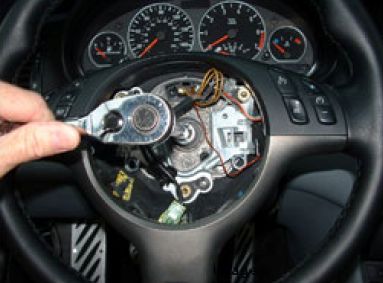 Unbolt steering wheel
