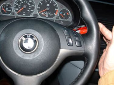 Depress steering wheel retainers