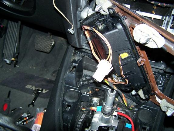 Remove trim for storage compartment (wood grain on center console)